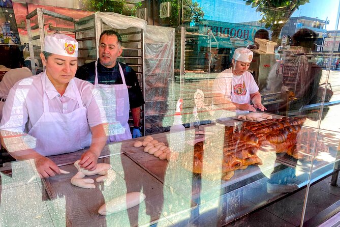 Fisherman’s Wharf Highlights Tour + Golden Gate Bay Voyage - Ghirardelli Square: classic landmark, quick time box