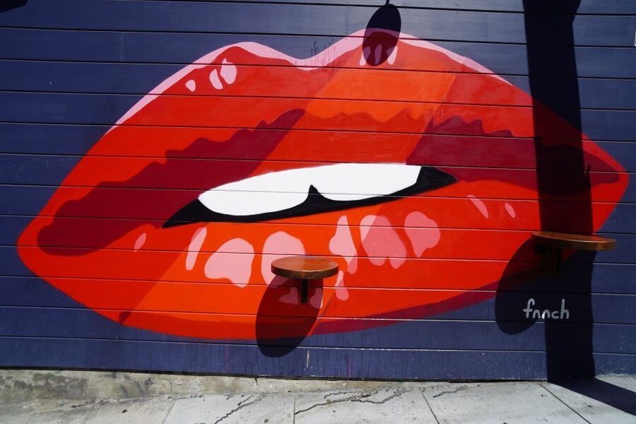 San Francisco: North Beach Food and History Walking Tour - Murals at Saint Francis of Assisi Church and the Luigi Brusatori connection