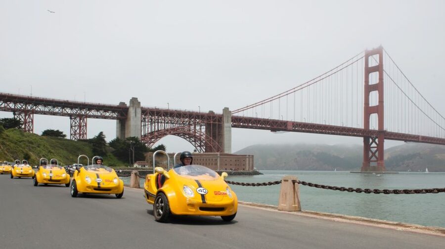 San Francisco: Self-Drive Landmarks Tour with Painted Ladies - The yellow three-wheeler: helmets, ages, and the deposit you should plan for