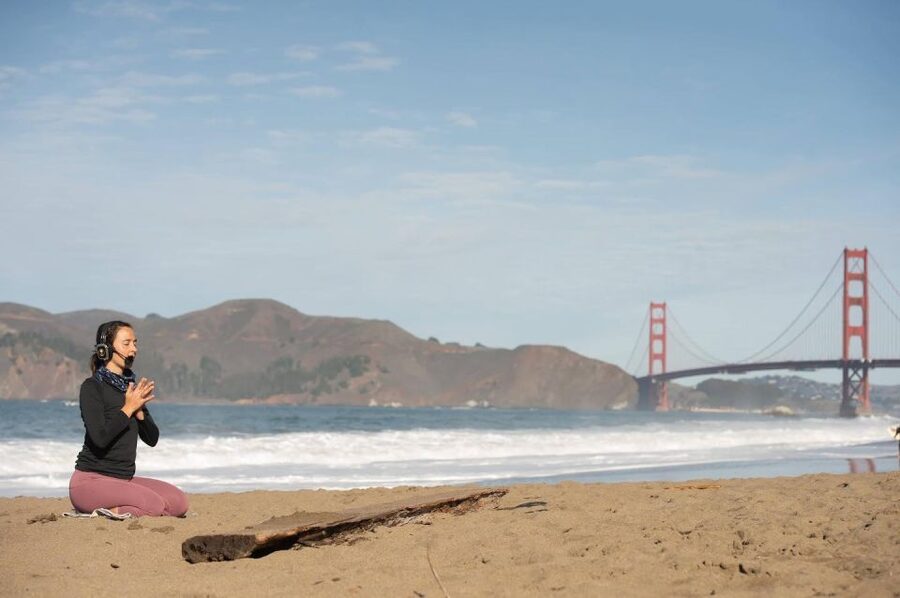 San Francisco: Silent Disco Yoga at Baker Beach - The water-edge dance moment, and why it works